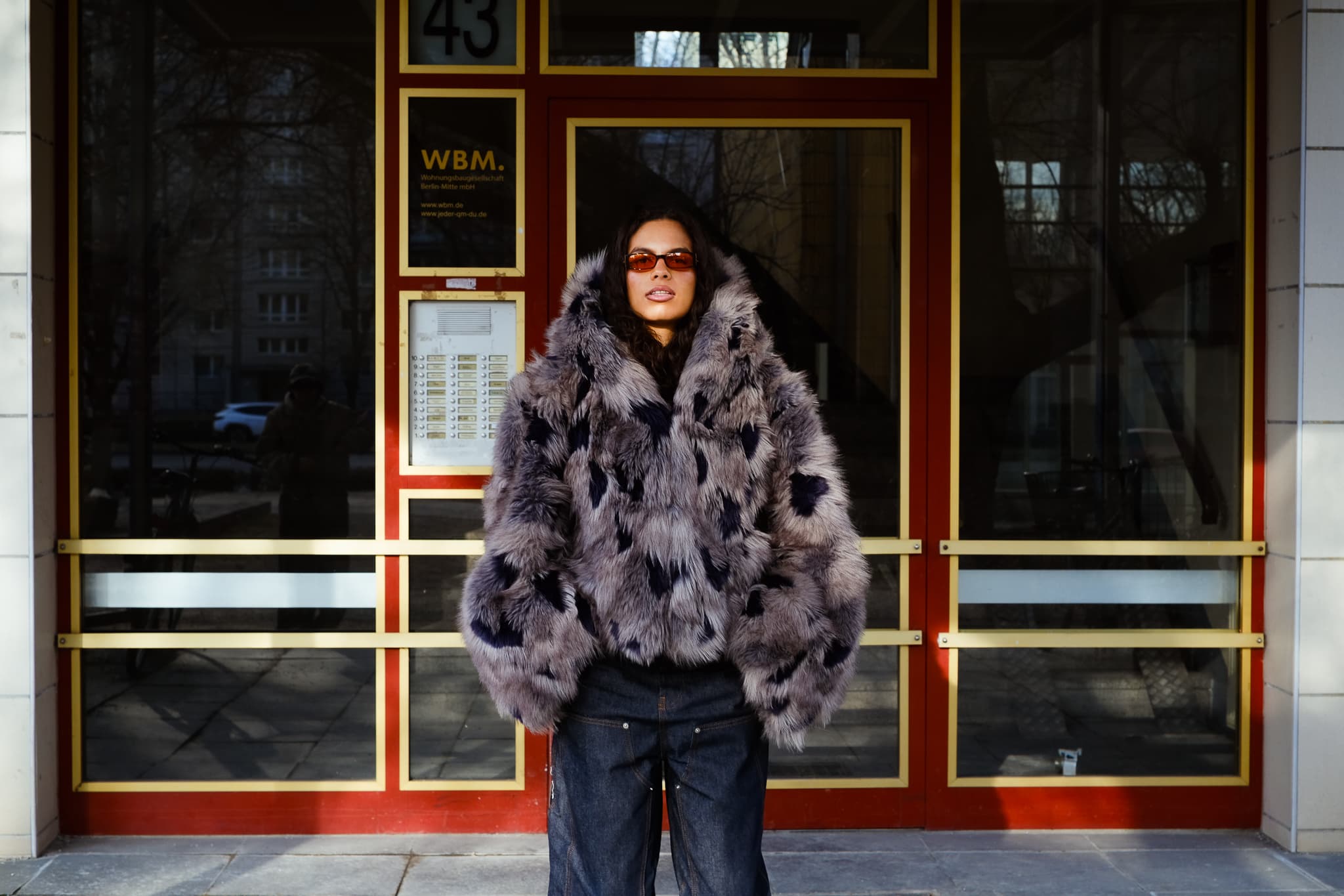 MARÍAJOSÉ in fur coat on a Berlin sidewalk