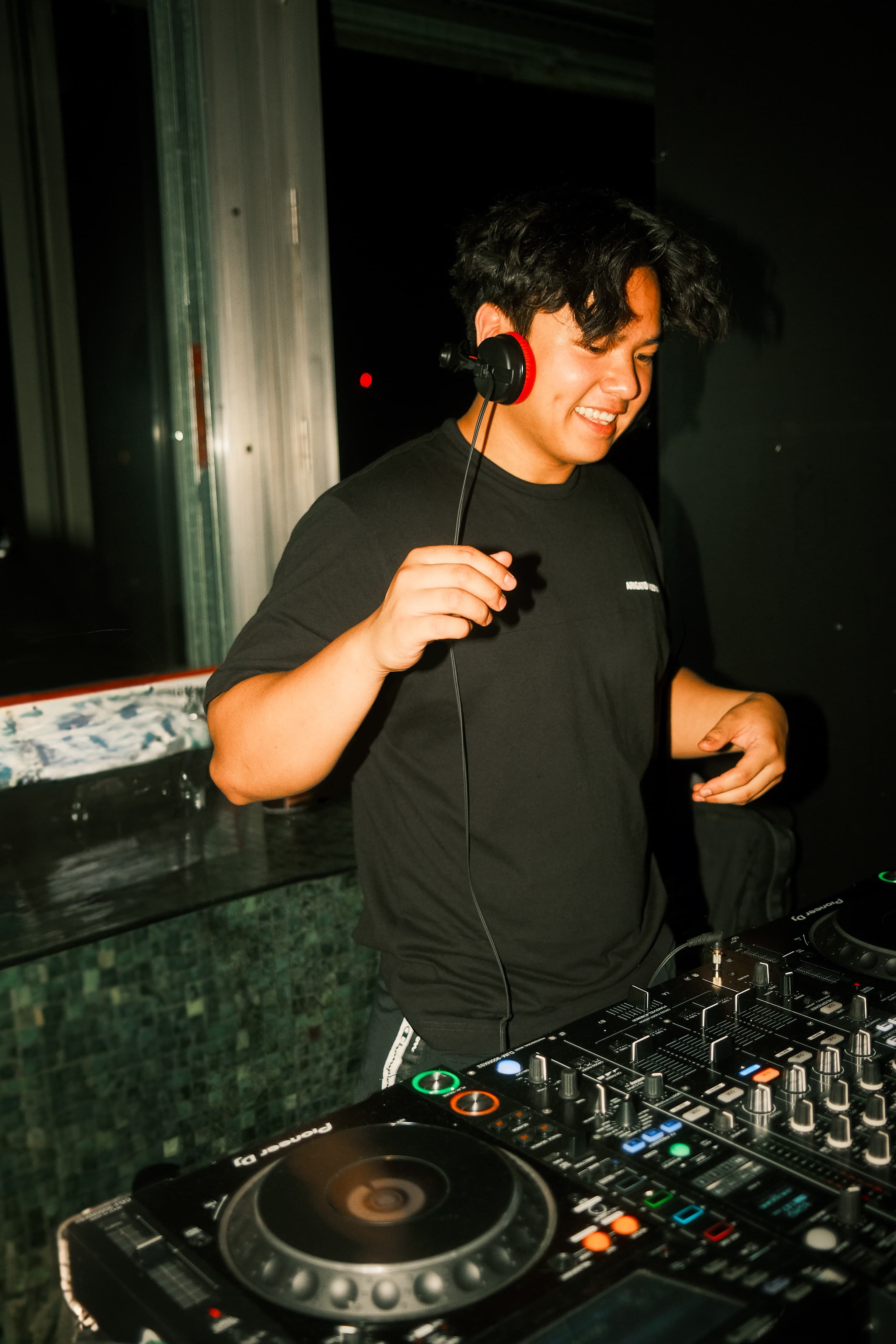 GESHA DJing at a bar